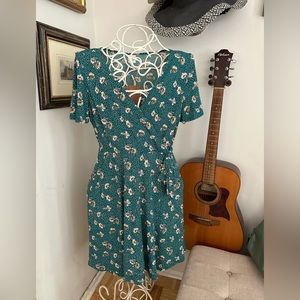 Green print faux wrap dress